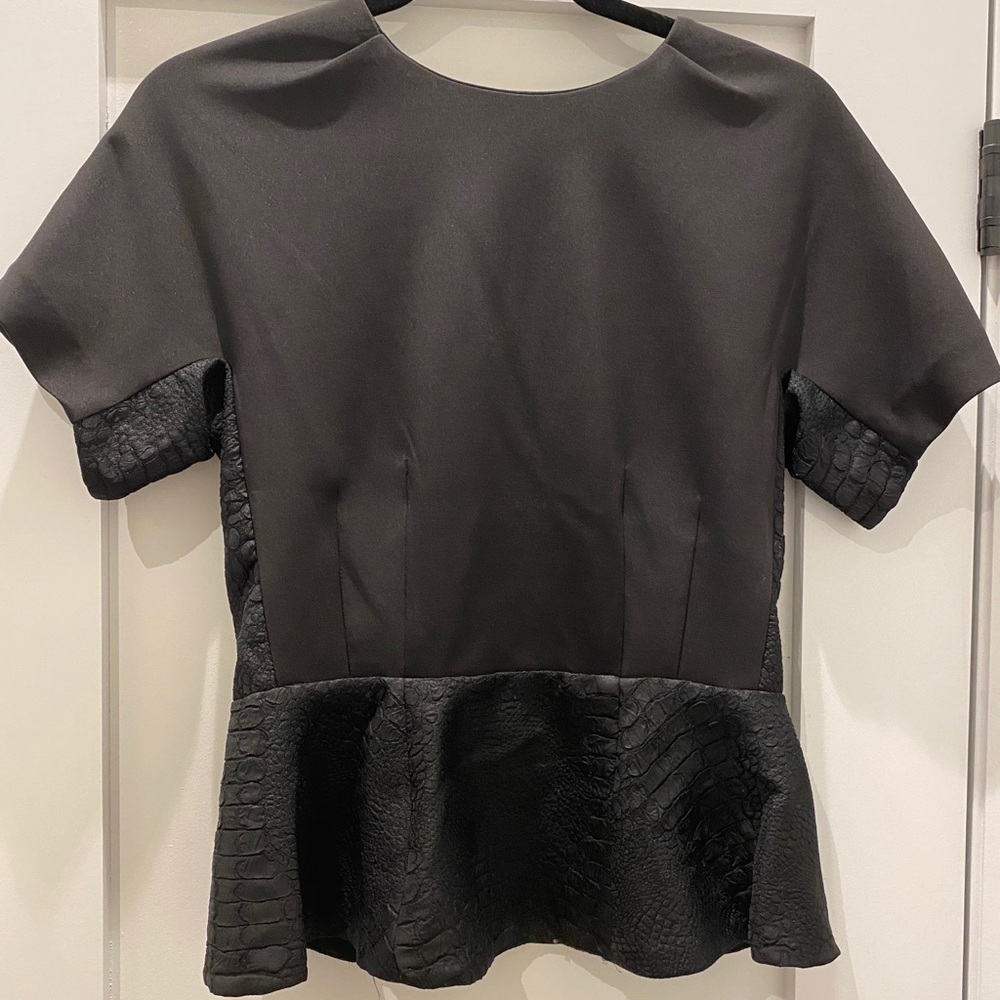 Black peplum top with faux snake print